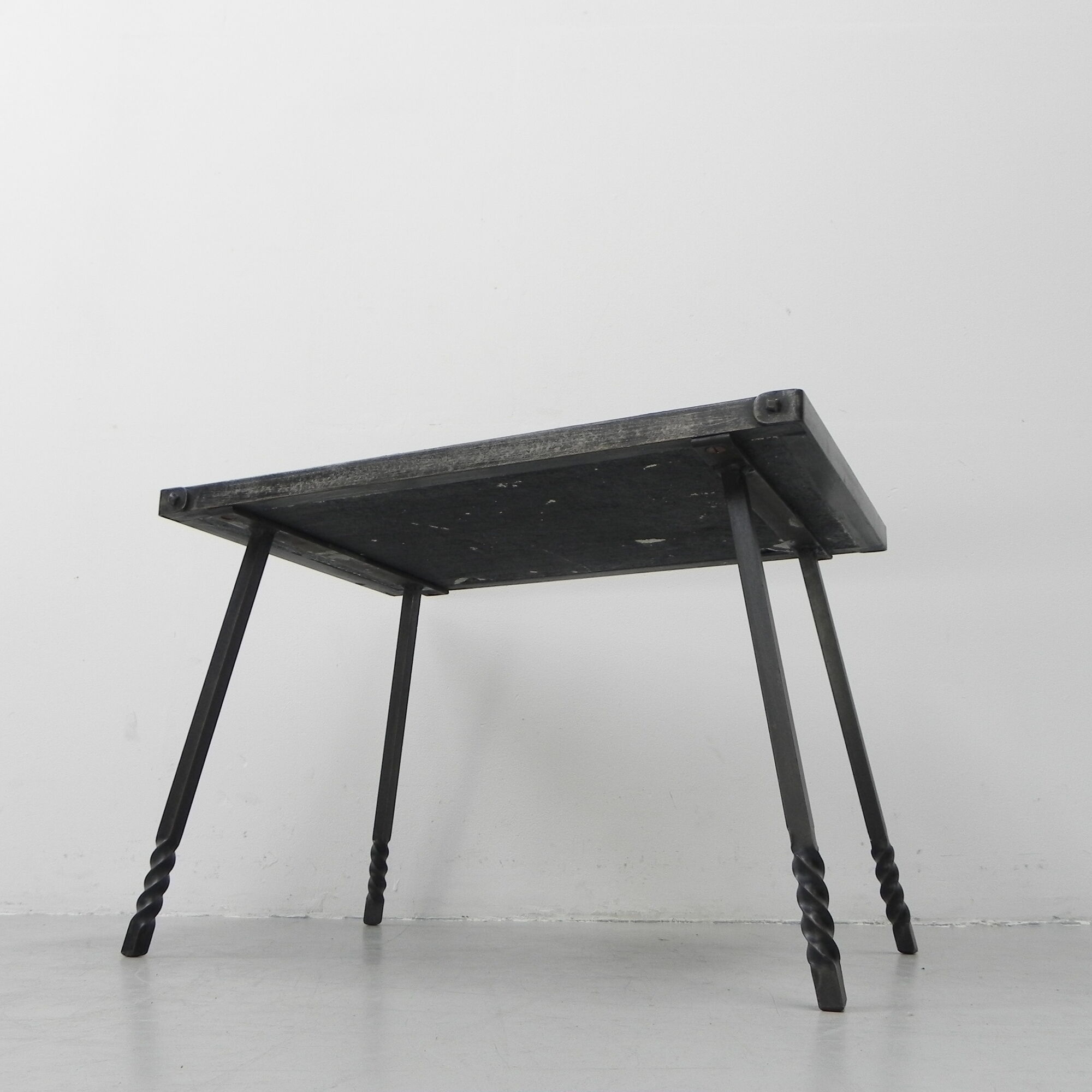 Brutalist coffee table with slate top