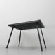 Brutalist coffee table with slate top