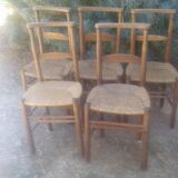 Set of five straw church chairs
