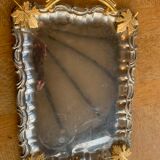 Silver metal top and decoration of foliage and handles in vintage brass