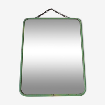 Old barber mirror of mint green color