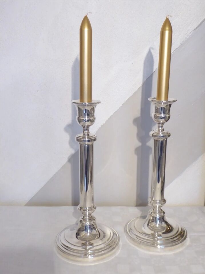 Pair of silver metal candle holders