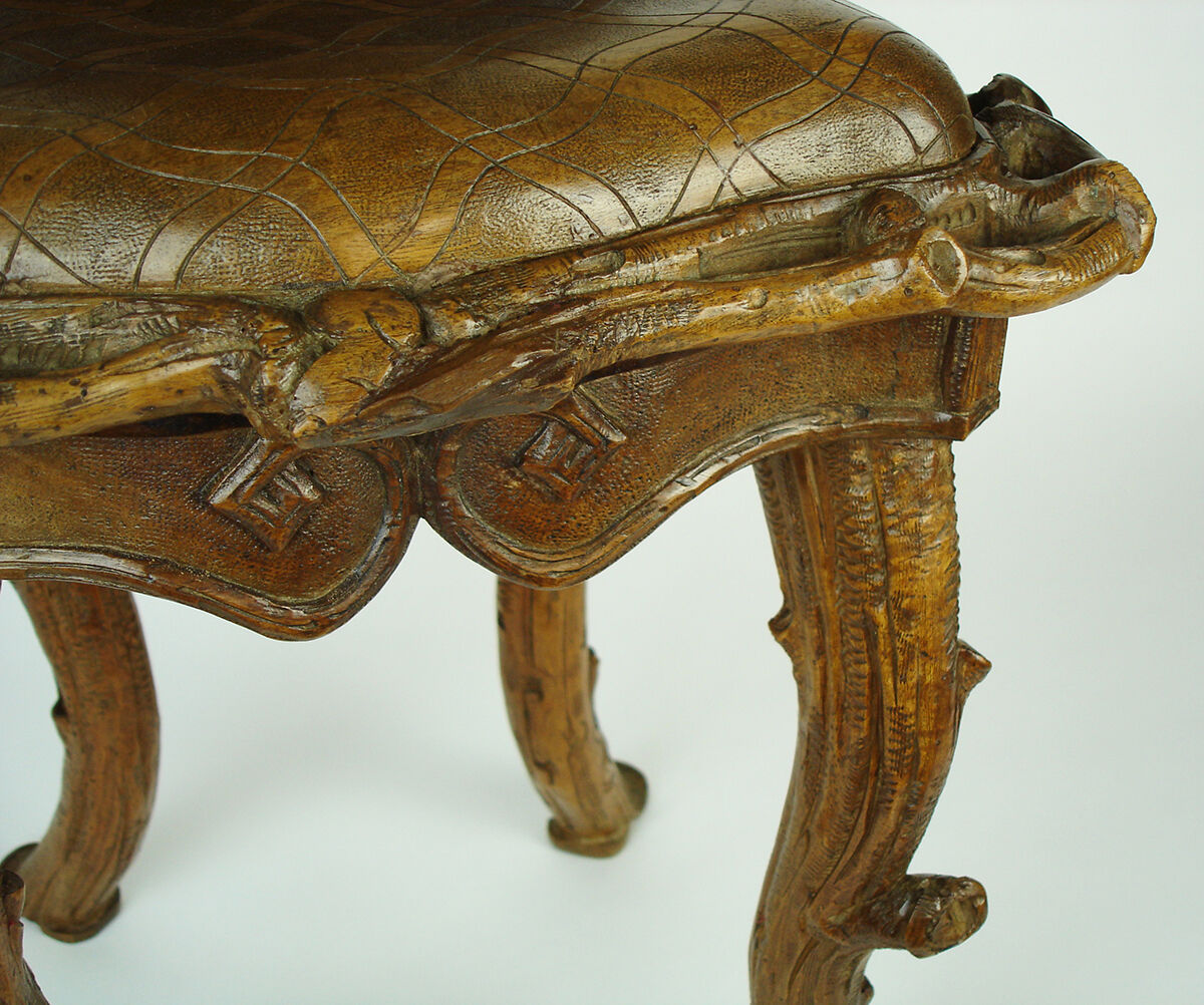 Sculpted chair in "black drill" style