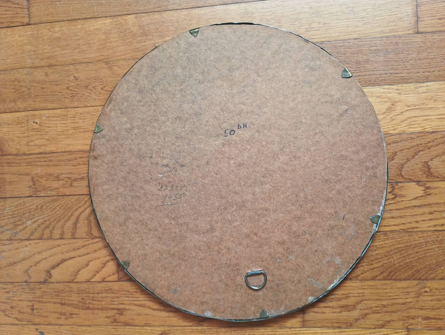 Oriental brass mirror