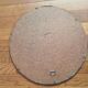 Oriental brass mirror