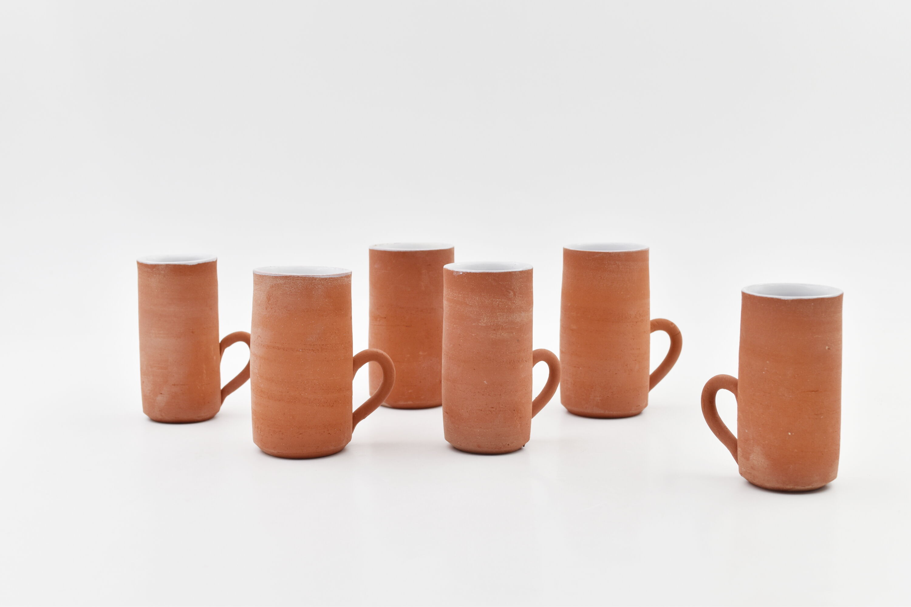 Series of six terracotta cups