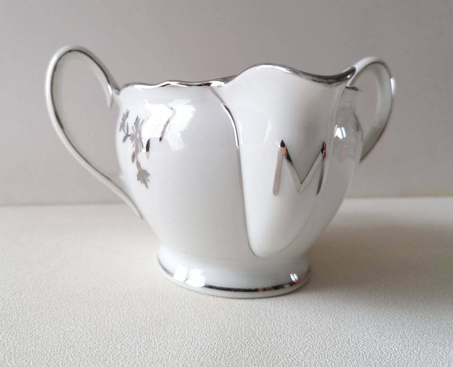 Limoges Maigre Gras porcelain sauce boat with silver decoration