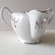Limoges Maigre Gras porcelain sauce boat with silver decoration