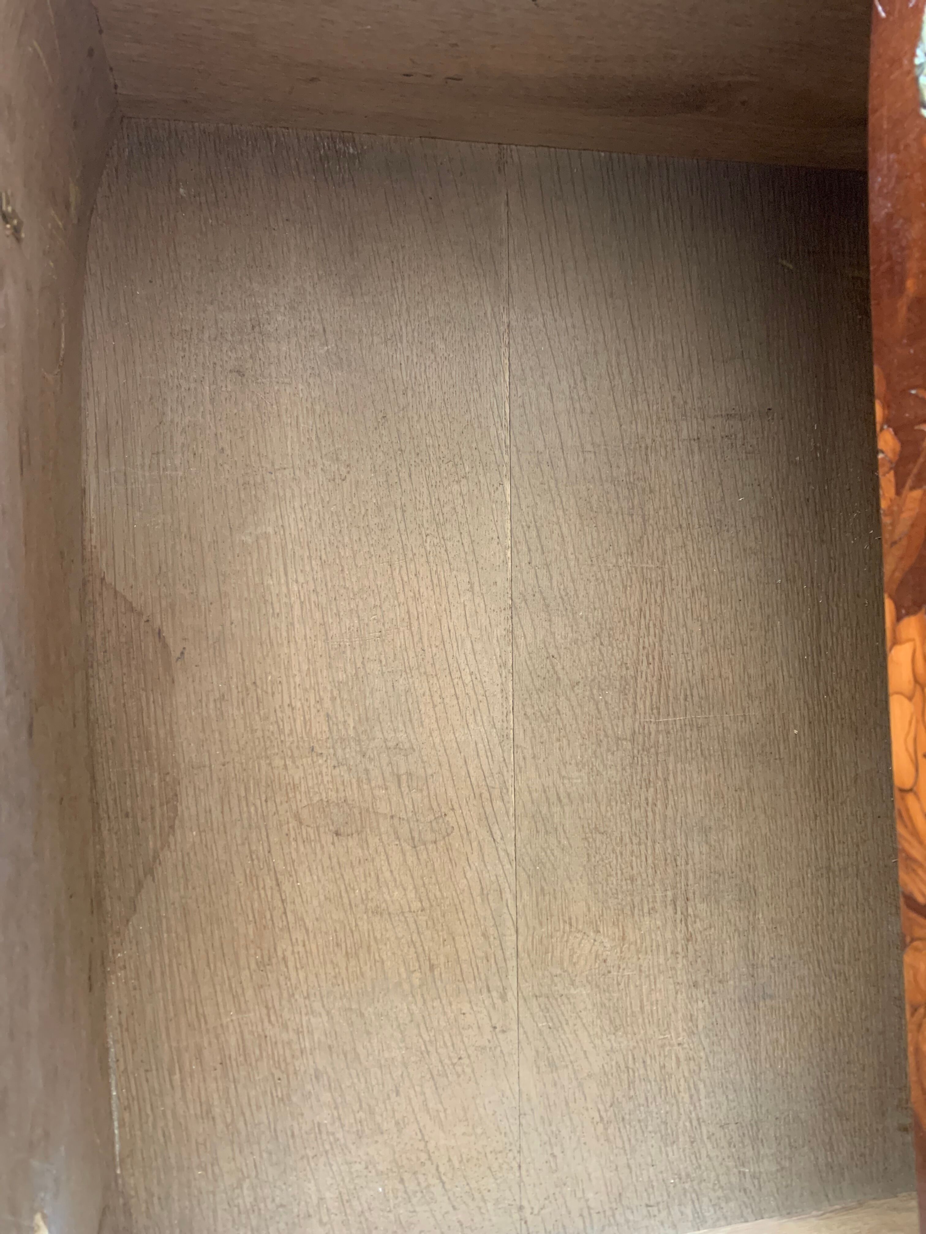 Louis XVI style half-moon chest of drawers in late nineteenth century marquetry