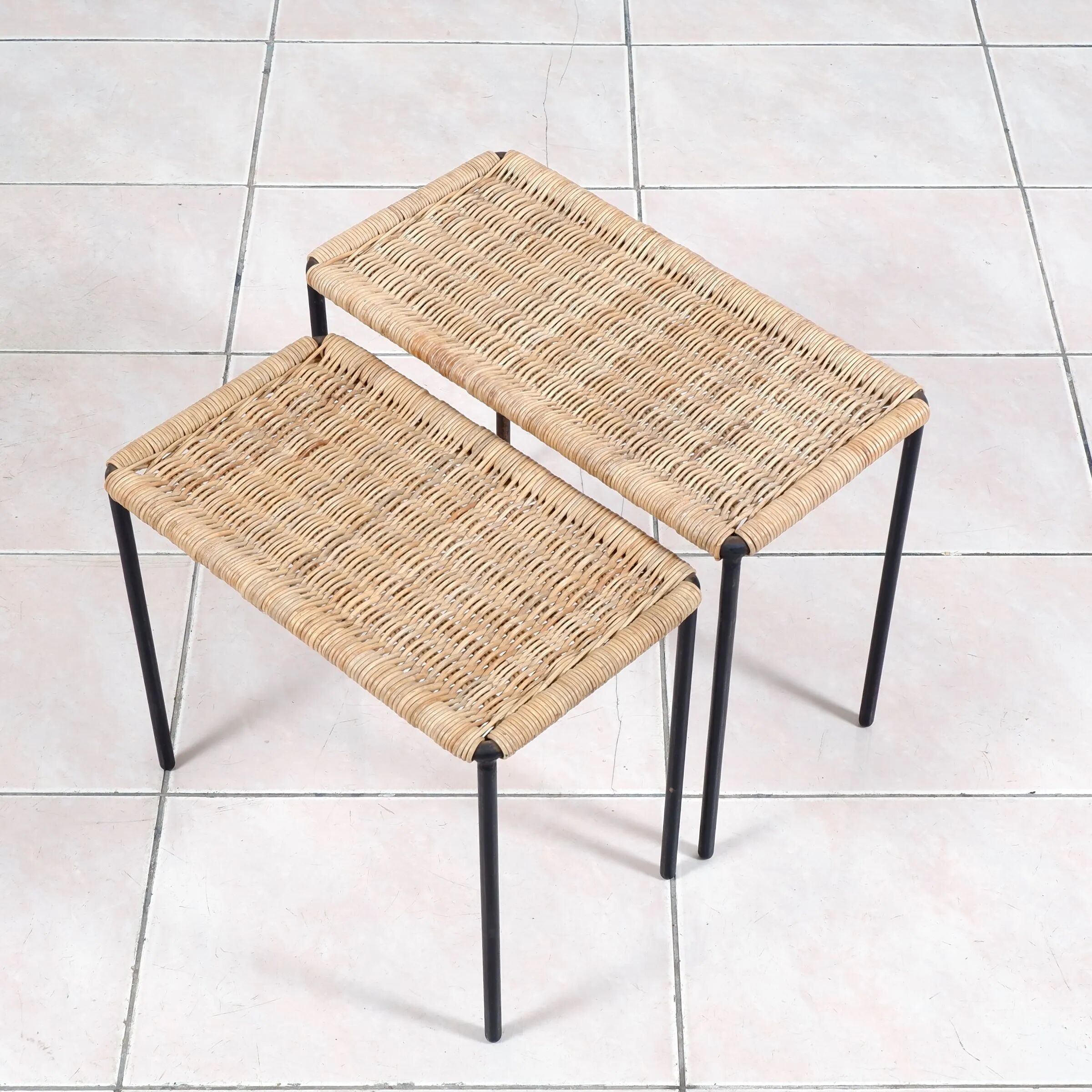 Nesting tables in metal / rattan by Carl Auböck