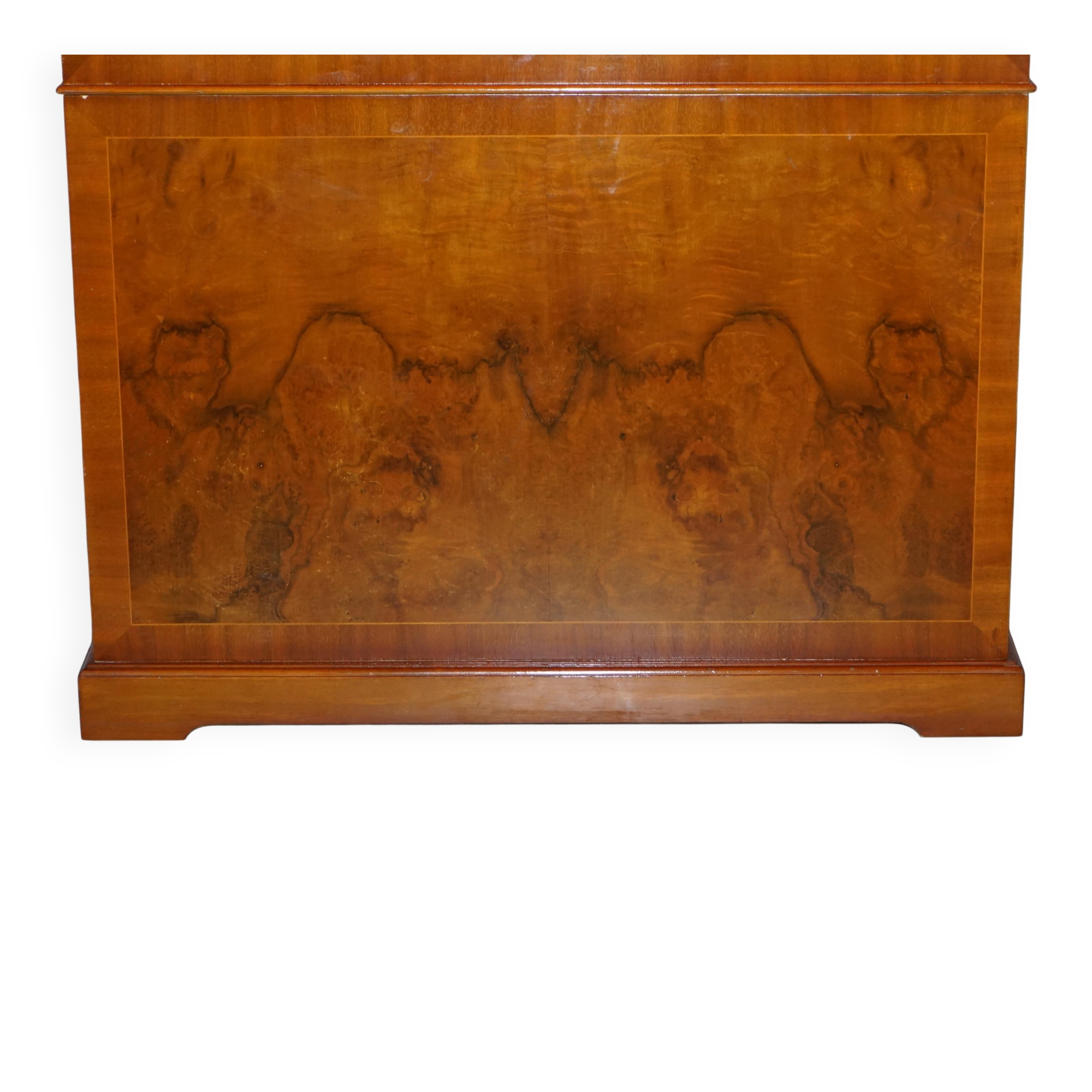 Partner desk in burr walnut designed to conceal computer equipment.