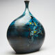 Large blue vase with ceramic rider by Jean de Lespinasse