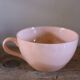 A set of two Digoin Sarreguemines Marylou Rose Art Deco cups.