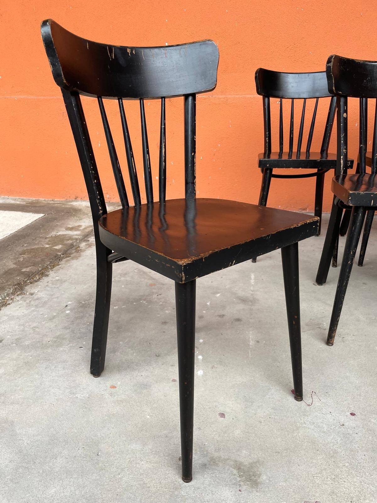 Set of 18 curved wooden bistro chairs with patina from the 60s