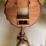 A pair of reclining side tables.