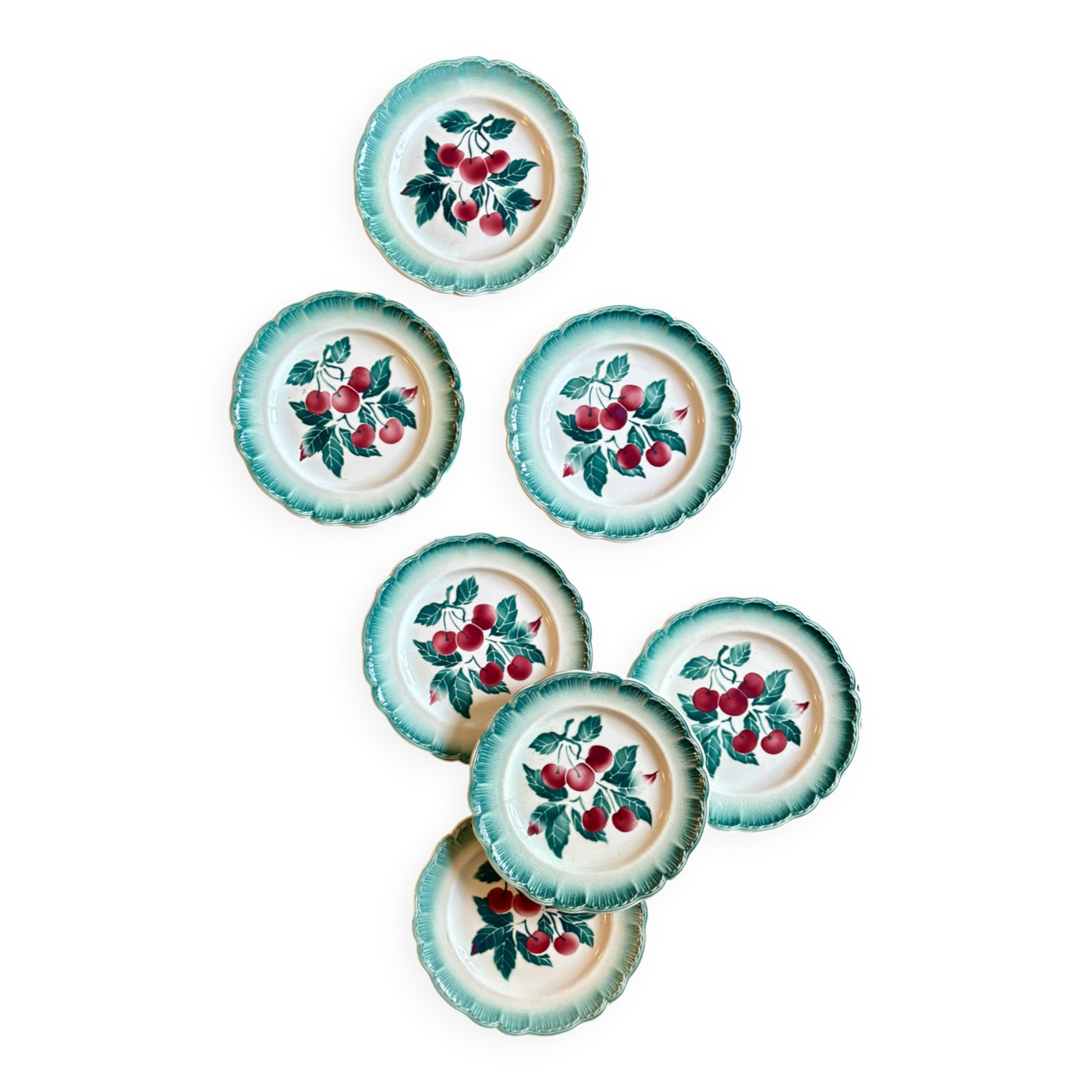 Set of 7 vintage Badonvilier dessert plates.