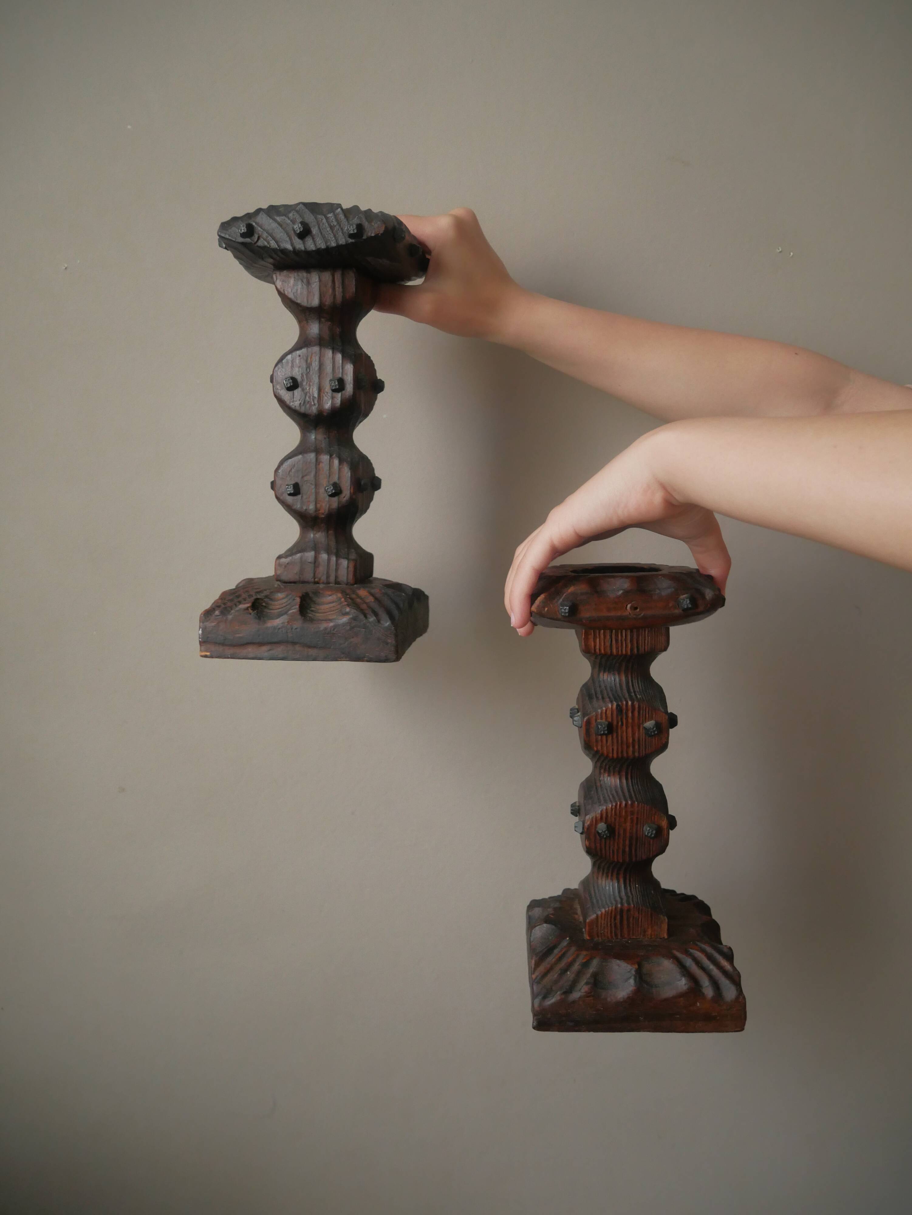 Pair of carved wood candlesticks iron nails handcrafted brutalist design candlesticks