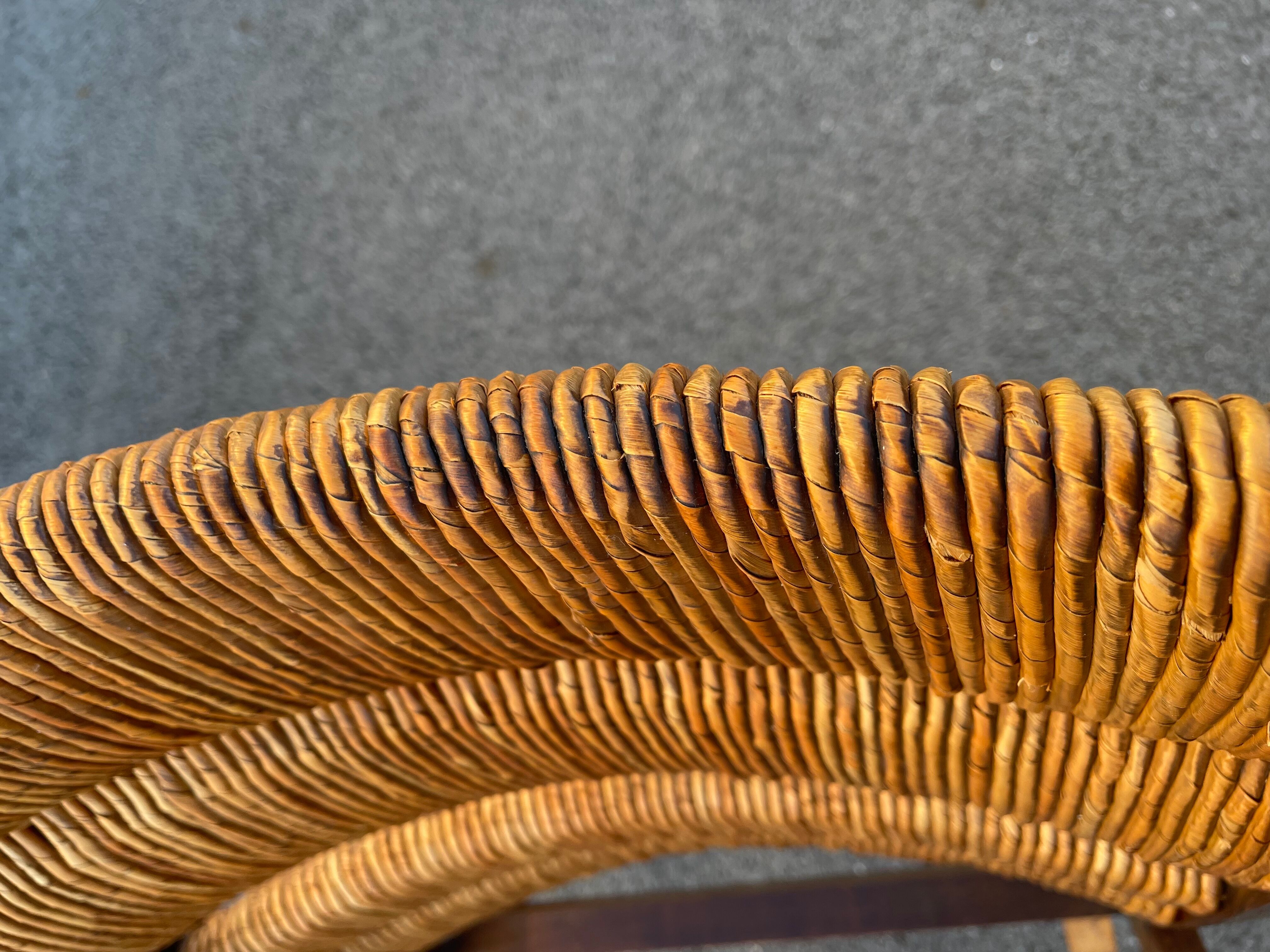 Vintage armchair in straw and brutalist wood