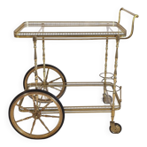 Very beautiful rolling trolley in brass and glass by Maison Baguès.