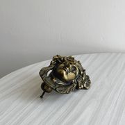 Large antique style brass metal knocker.
