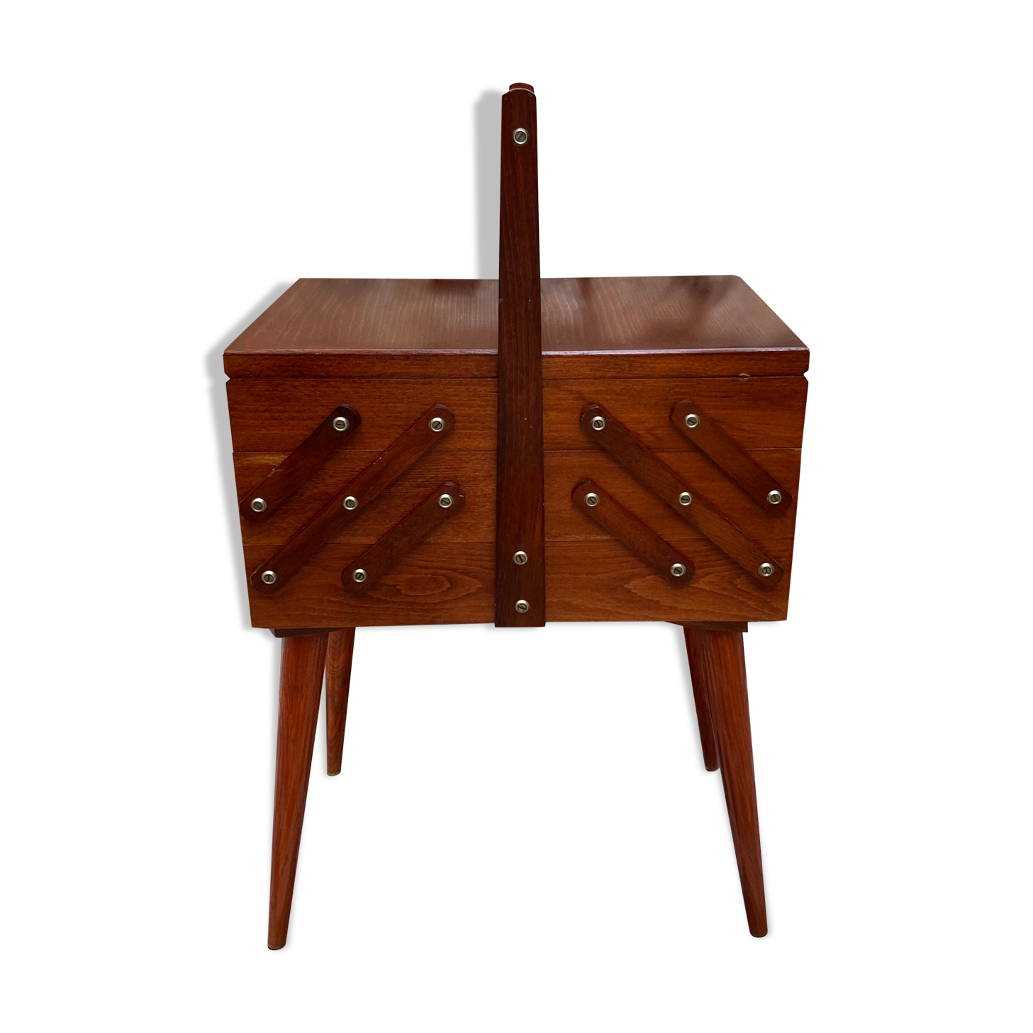 Worker sewing feet spindles