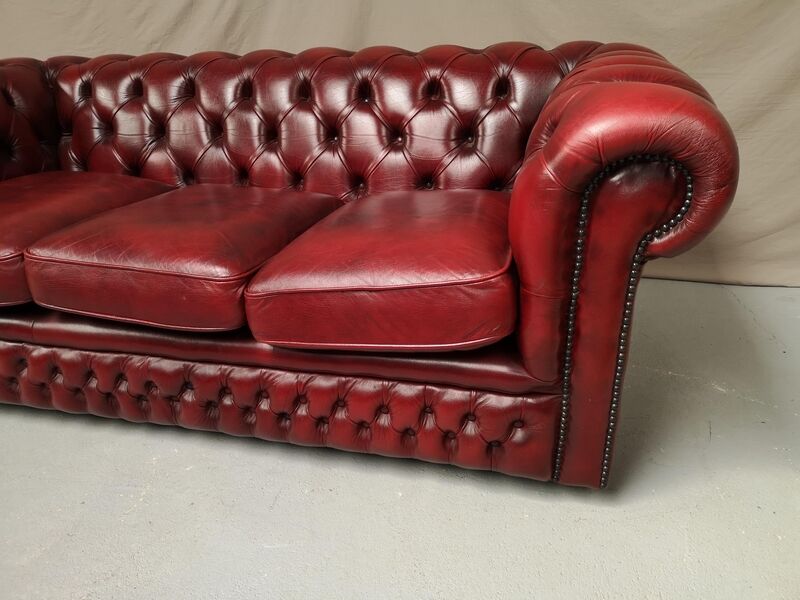 Red leather chesterfield sofa