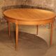 Oval light oak table with extension