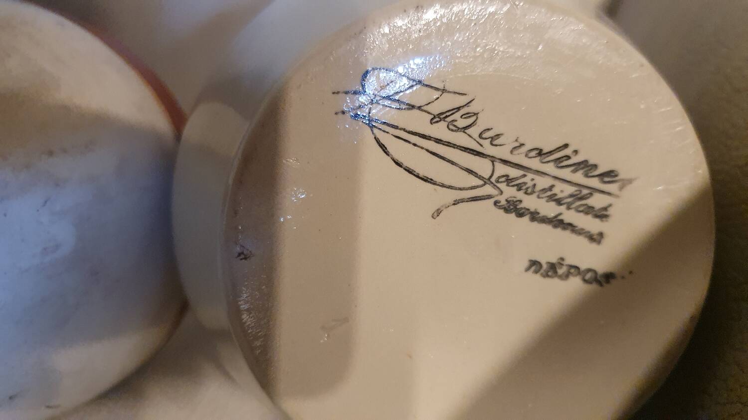 Three glazed stoneware carafes Bardinet distiller Bordeaux