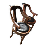 Paire de fauteuils pivotants antiques marron en tissu d'ameublement, cadre bois, Hongrie vers 1900