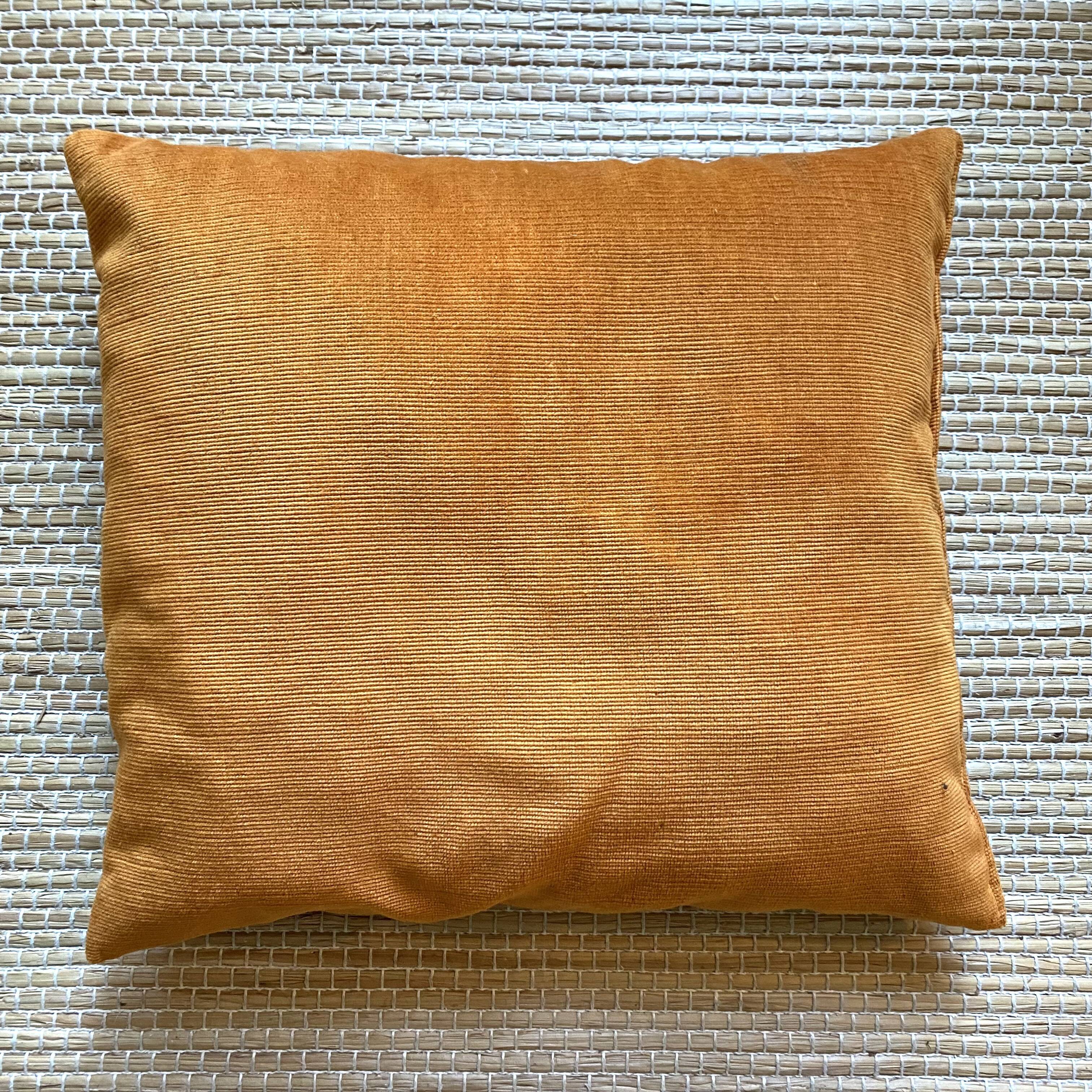 Vintage ochre velvet cushion