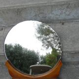 Miroir rond sur meuble 60's
