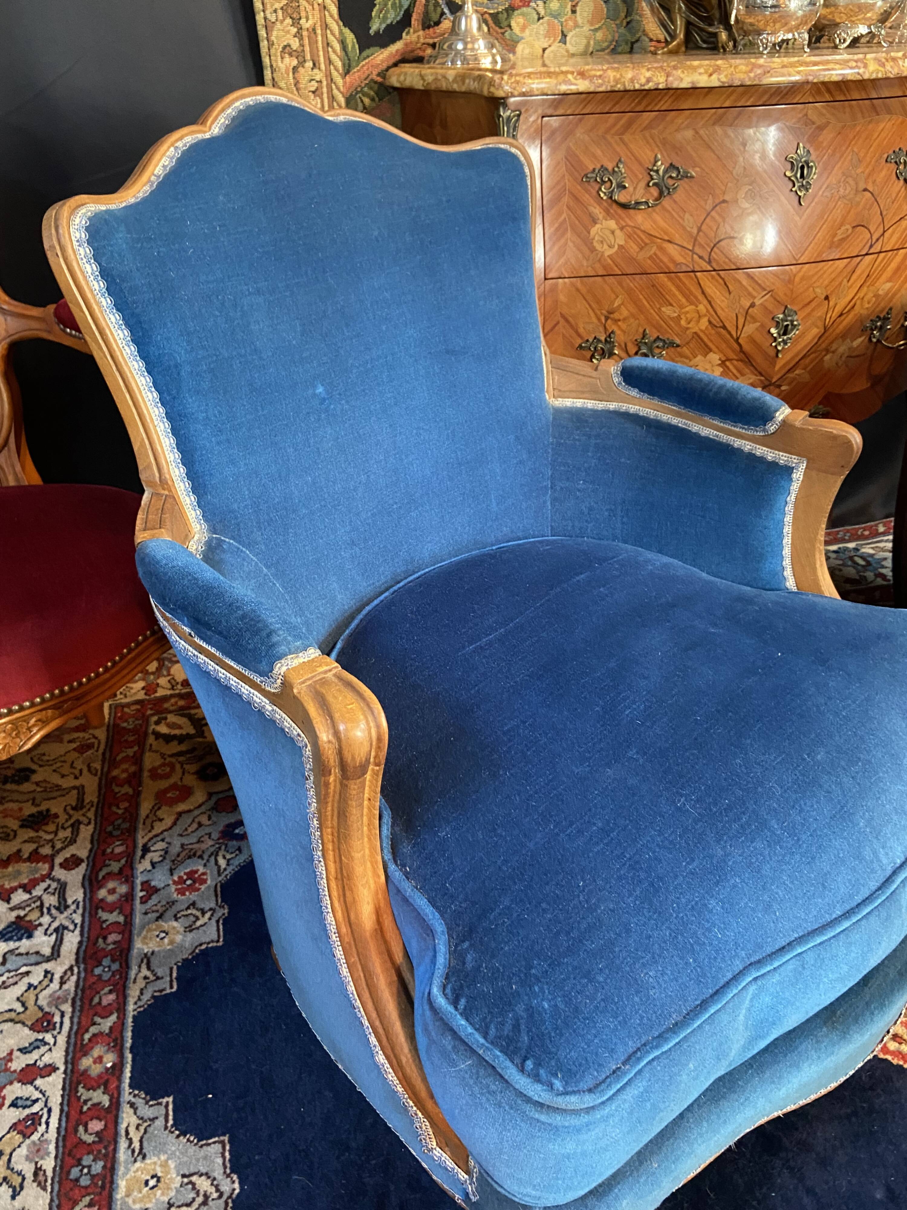 Pair of Louis XV style blue velvet bergère armchairs