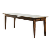 Table en chêne ancien du 19ème siècle avec un plateau en noyer pour 6 à 8 personnes.