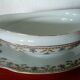 Limoges porcelain sauce boat with lanternier decoration and blue cornflower.