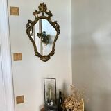 Large golden baroque style mirror