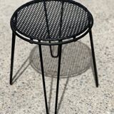 Perforated metal stool