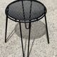 Perforated metal stool