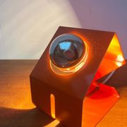 Orange metal table lamp, minimalist, modern mid-century space age, 1960s.