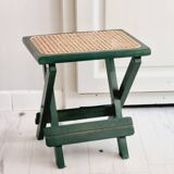 Small folding stool in green wood and cane