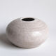 Vintage white ceramic round vase