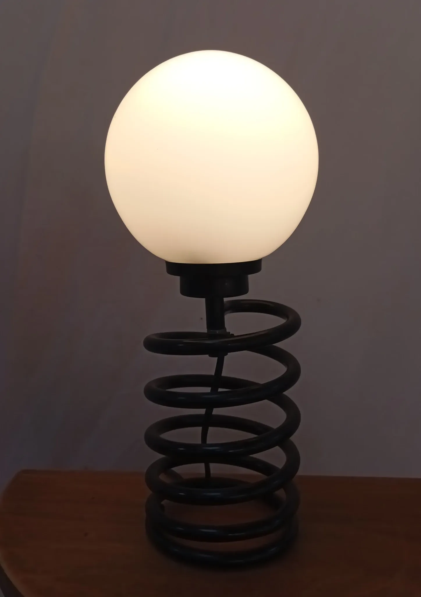 Spring lamp from the 1980s, design by Ingo Maurer.