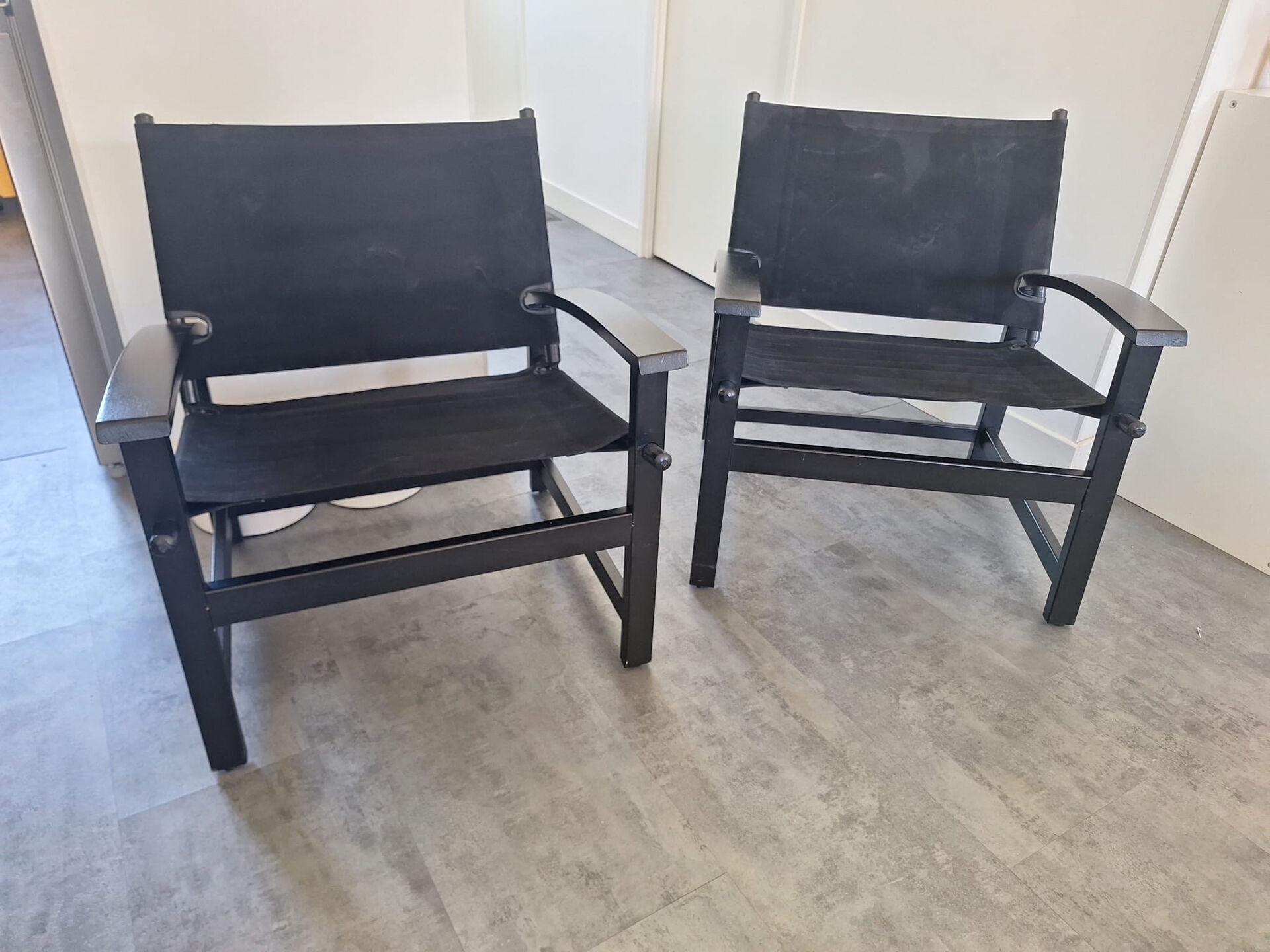 Pair of vintage "safari" style armchairs published by Hyllinge Møbler.