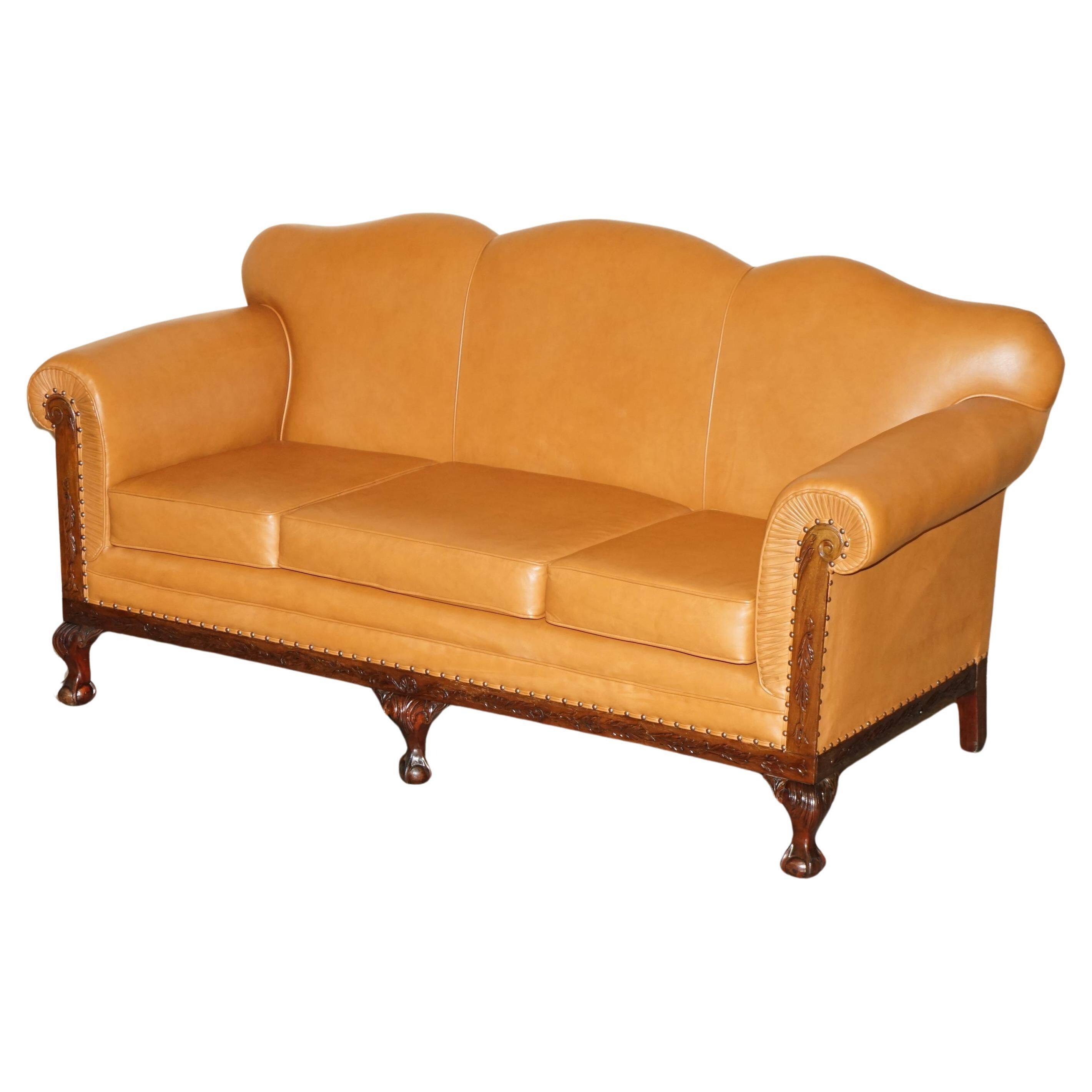 Restored three-seater leather canapé in late Victorian style.