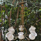 Vintage 8-light chandelier in brass and frosted white and gold glass.