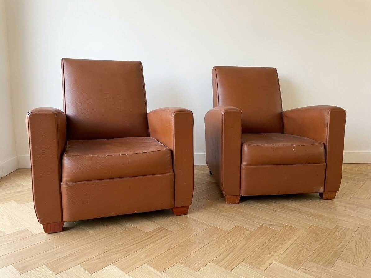 Pair of vintage brown leather club chairs