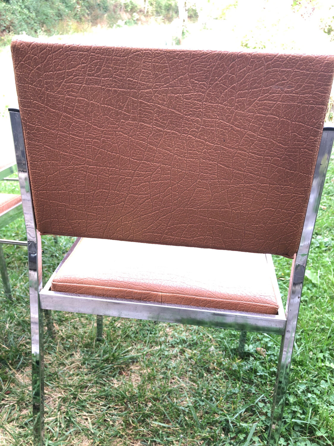 Skai and chrome chairs