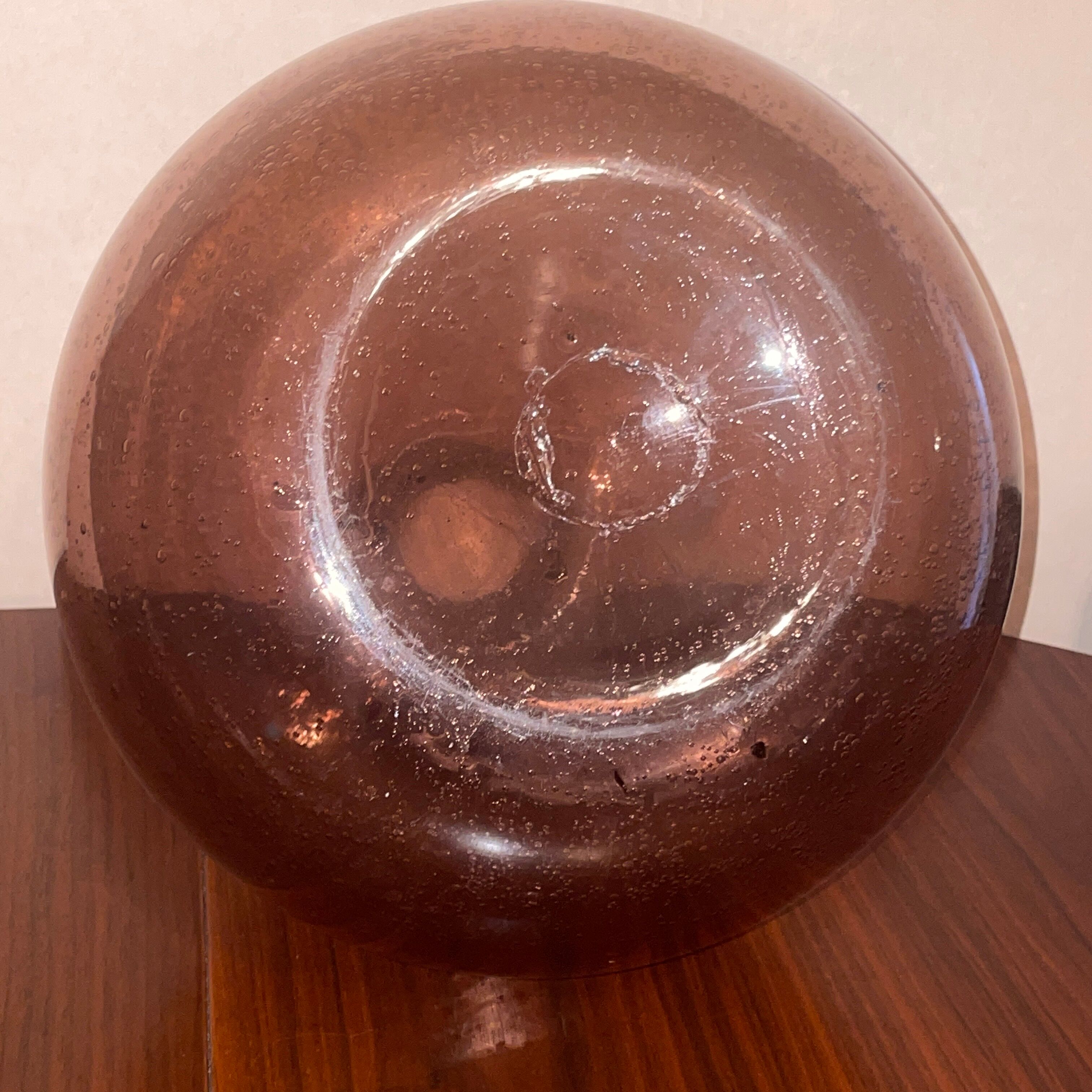 Bottle  in blown and bubbled glass