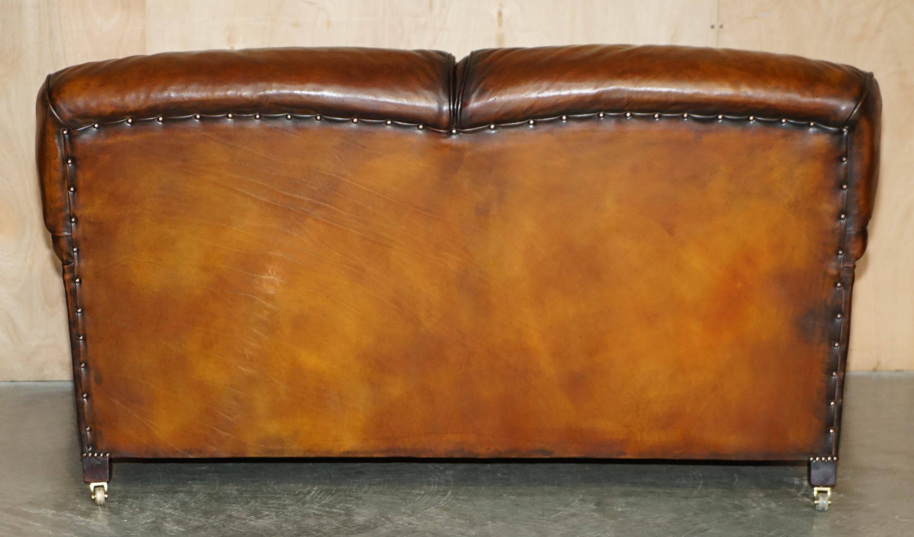 Howard & Son restored leather canapé, width 145 cm