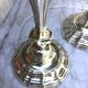 Pair of silvered metal candlesticks in the Louis XIV style.