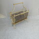 Brass magazine rack 1960